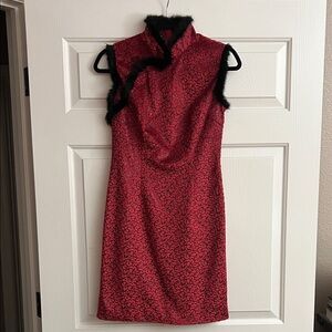 Elegant Red Sleeveless Dress with Black Trim